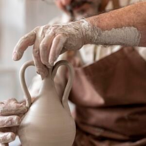 close-up-hands-doing-pottery close-up-hands-doing-pottery